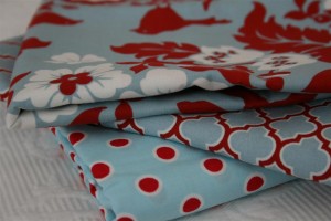 red, aqua and white fabric