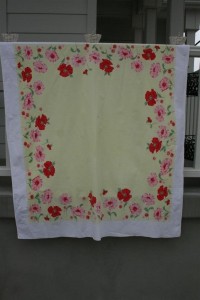 vintage yellow tablecloth with pink and red flowers