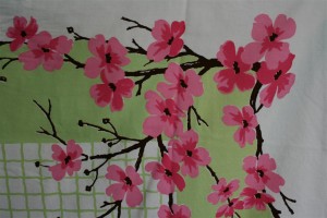 green vintage cloth with pink blossoms