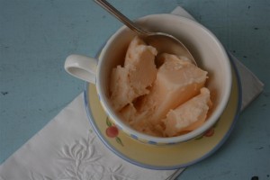 peach frozen yogurt in teacup