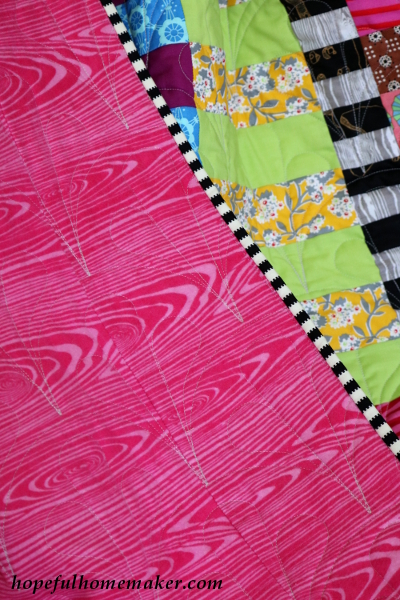 bright pink woodgrain flannel for quilt back - hopefulhomemaker.com