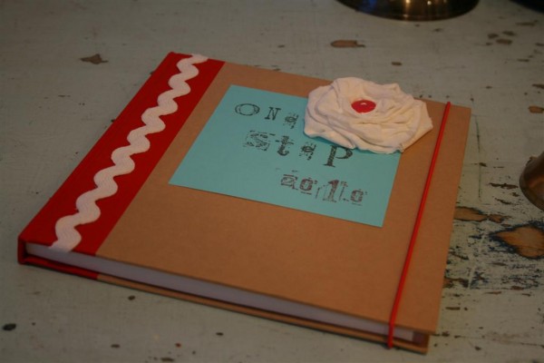 picture of One Step journal with rick rack and fabric flower