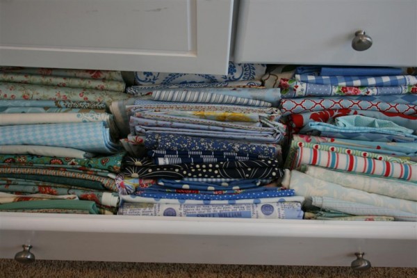 drawer filled with blue fabrics
