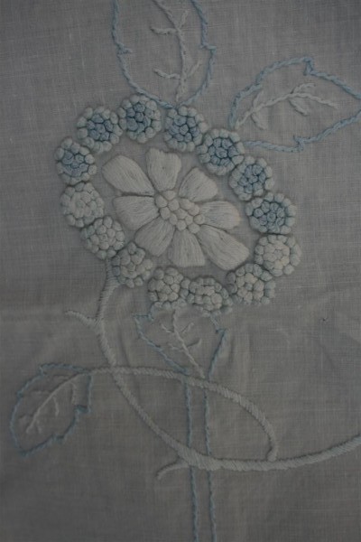 blue and white french knots flower