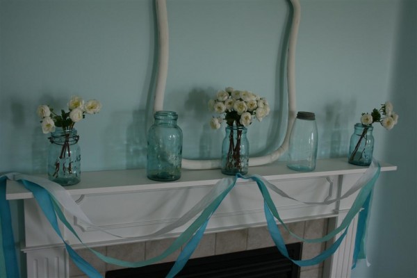 vintage blue jars on mantel