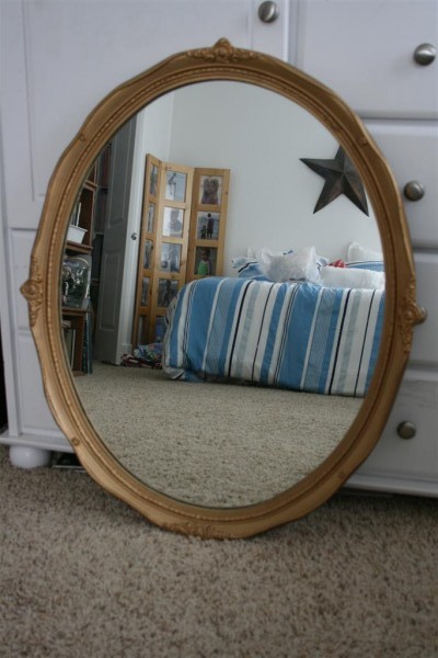 gold oval mirror